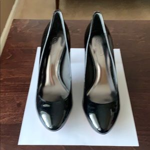 Coach High-heeled patent black leather shoes